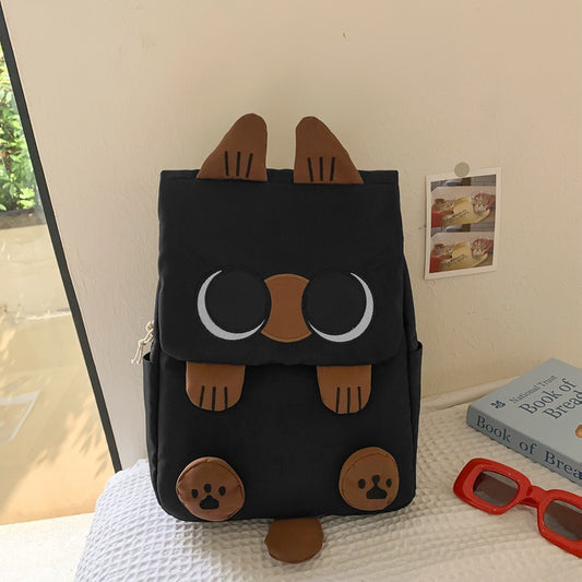 Black Lightweight Nylon Waterproof Schoolbag for Children - Large Capacity Daypack with Ugly-Cute Cat Design - Main product image