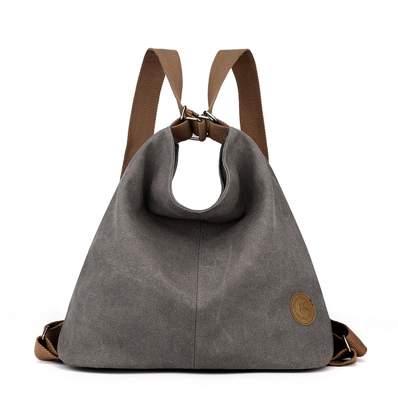Grey Versatile 3-in-1 Canvas Backpack and Shoulder Bag Large Capacity Handbag for Women Ideal for Travel School and Everyday Use - Main product image
