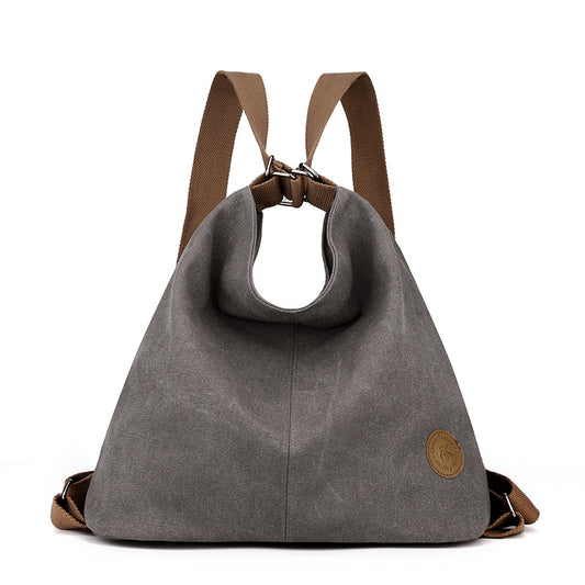 Grey Versatile 3-in-1 Canvas Backpack and Shoulder Bag Large Capacity Handbag for Women Ideal for Travel School and Everyday Use - Main product image